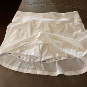 White Lululemon tennis skirt size 8. Worn 1 time
